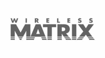 Logo of Jonas Construction Software's 'wireless matrix' showcasing sleek typography. The word 'matrix' is written in bold, with horizontal lines stretching out from the letters, symbolizing digital connectivity within the construction industry.