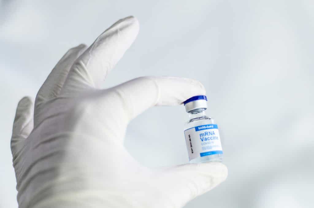 A hand hold the COVID-19 vaccine