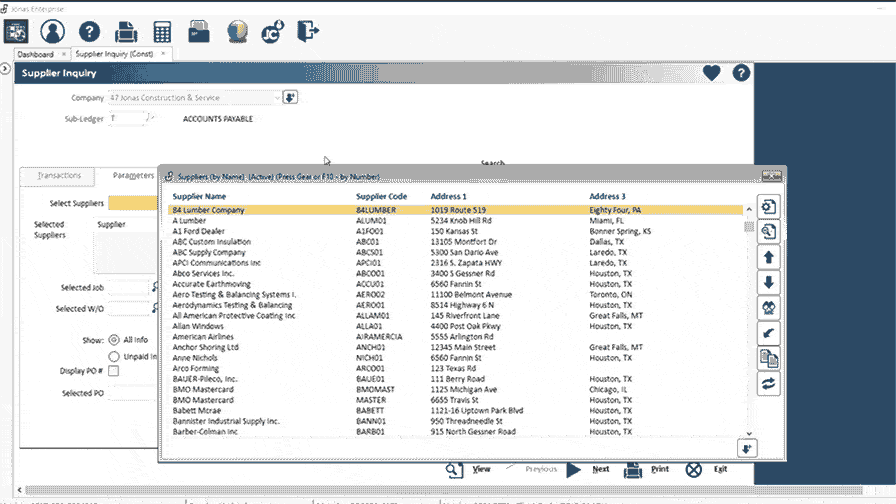 Alt text: A computer monitor featuring Jonas Construction Software's supplier inquiry window, detailing an organized list of supplier names, codes, and addresses for mechanical contractors to review.