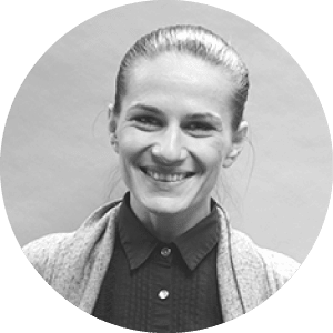 and she appears to be a professional in the construction or software industry. She embodies the target clientele for Jonas Construction Software; reliable and competent professionals seeking efficient solutions for their business operations.