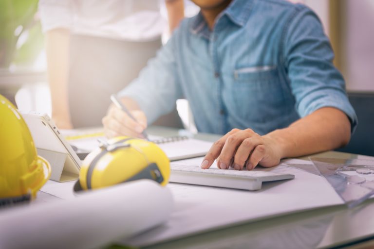 A construction accountant doing accounting work