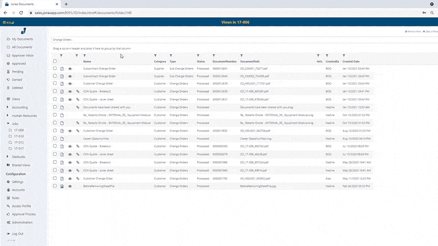 Alt text: Screenshot of Jonas Construction Software interface showing a detailed table of customer order entries with fields for order ID, customer name, order date and status amongst other information.