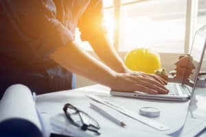 Accountant preparing chart of accounts for construction company